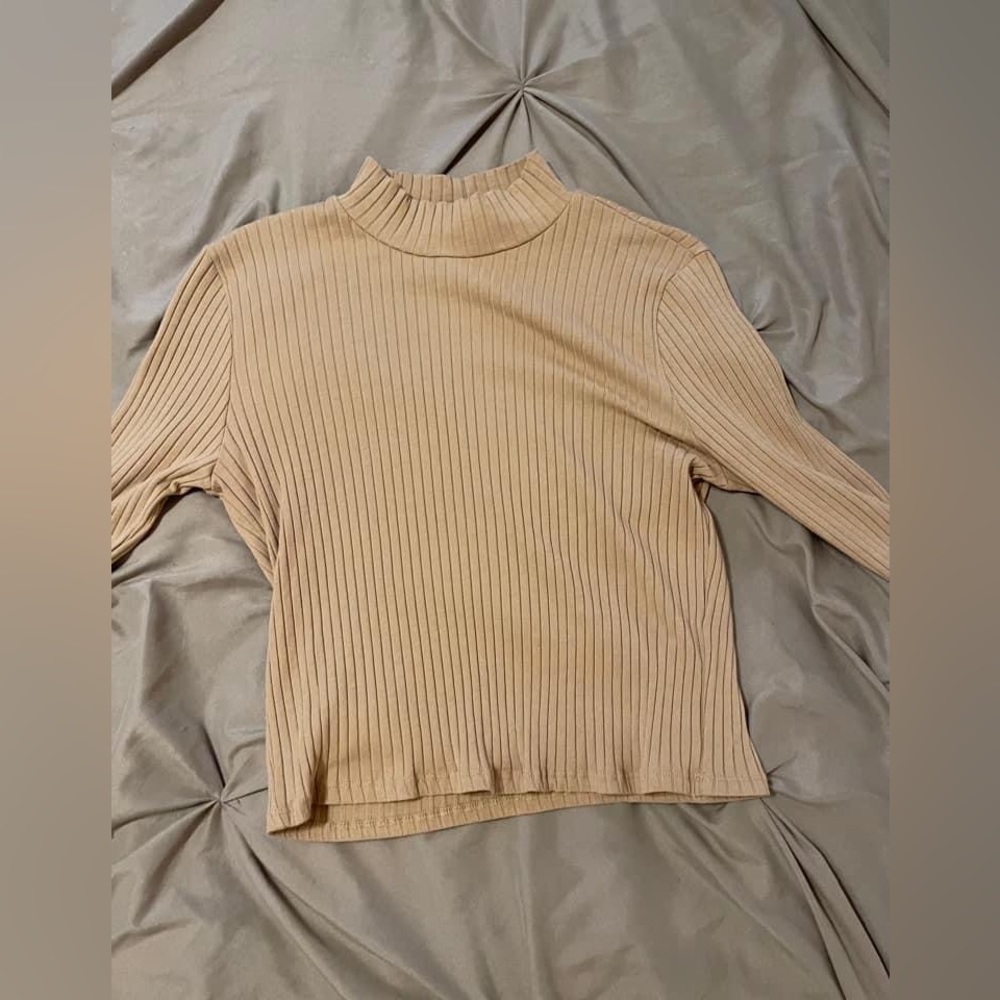 Large tan fitted turtle neck long sleeve.